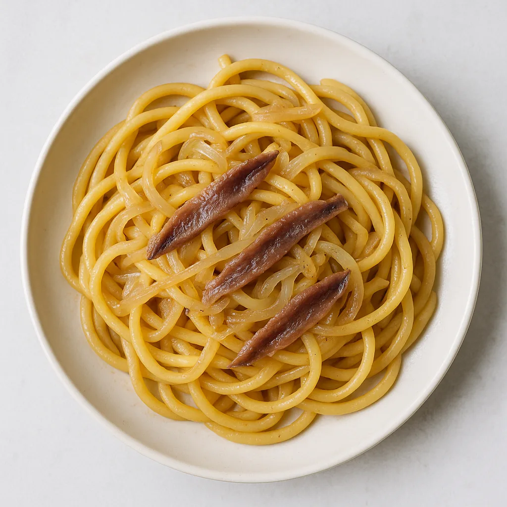 Bigoli With Anchovy And Onion — plant-based or original dish photo